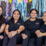 four educators sitting next to eachother at Daisy Lane Early Learning